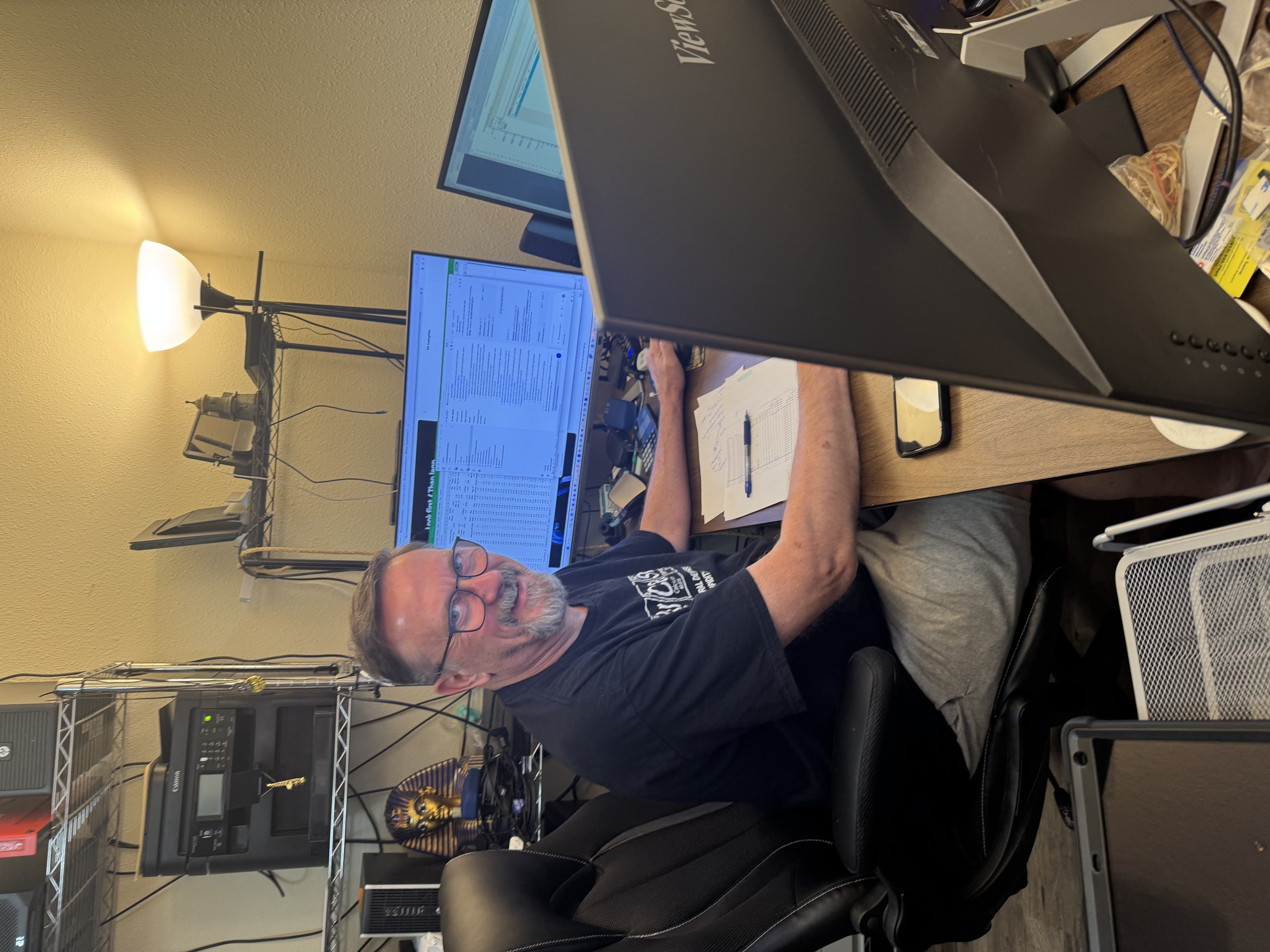 Chris Conley programming at his computer